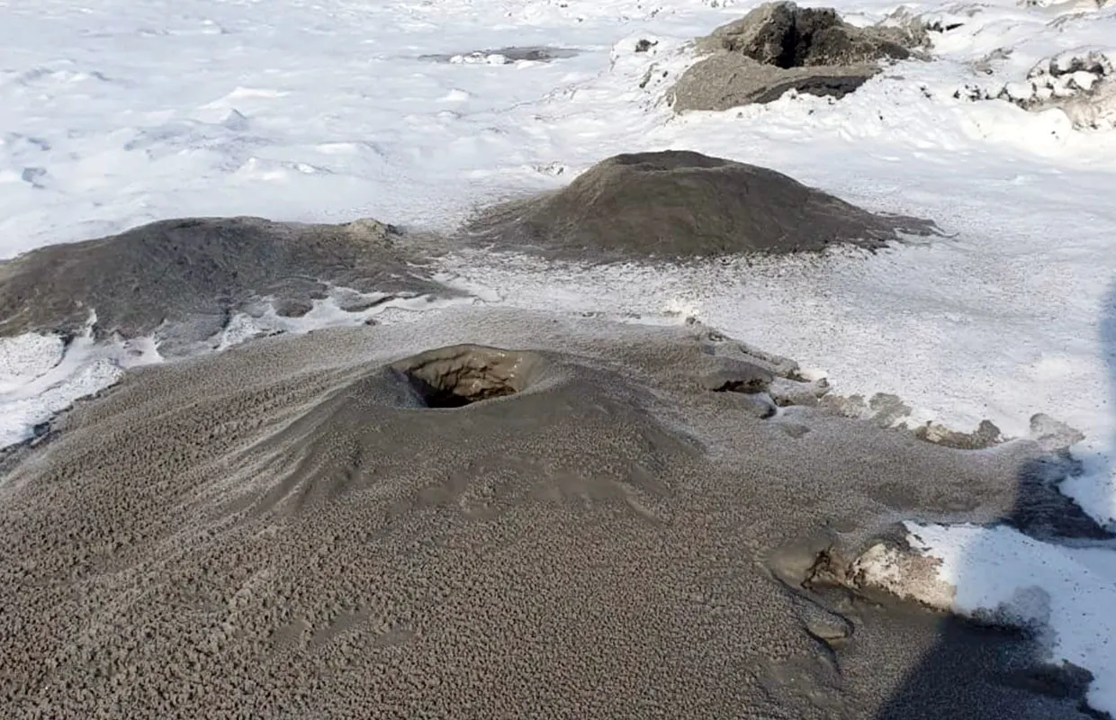 Winter snowmobile trip to Mud Volcano