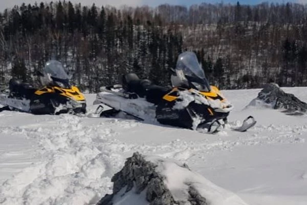 Winter snowmobile trip to Mud Volcano